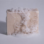 MooGoo Buttermilk Soap Bar stacked with other bars, natural hydrating cleanser for dry skin, free from SL